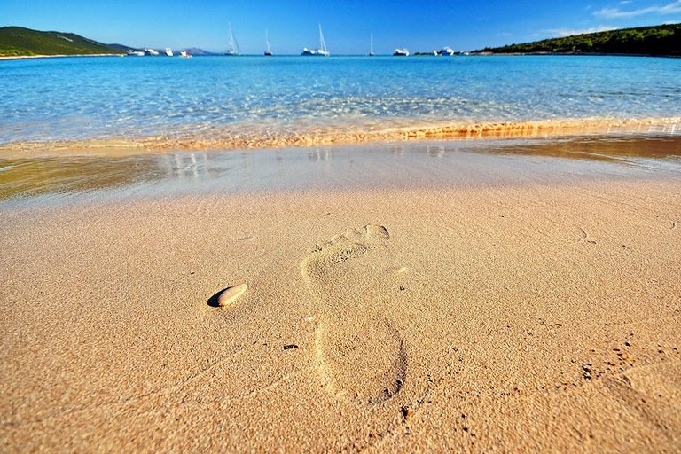 Foot in Sandy Beach Croatia | Travel Croatia