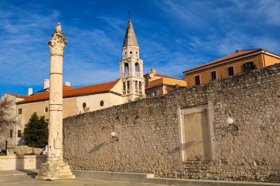 Pillar of shame and St.Elias's church on the Roma Capitolium in Zadar
