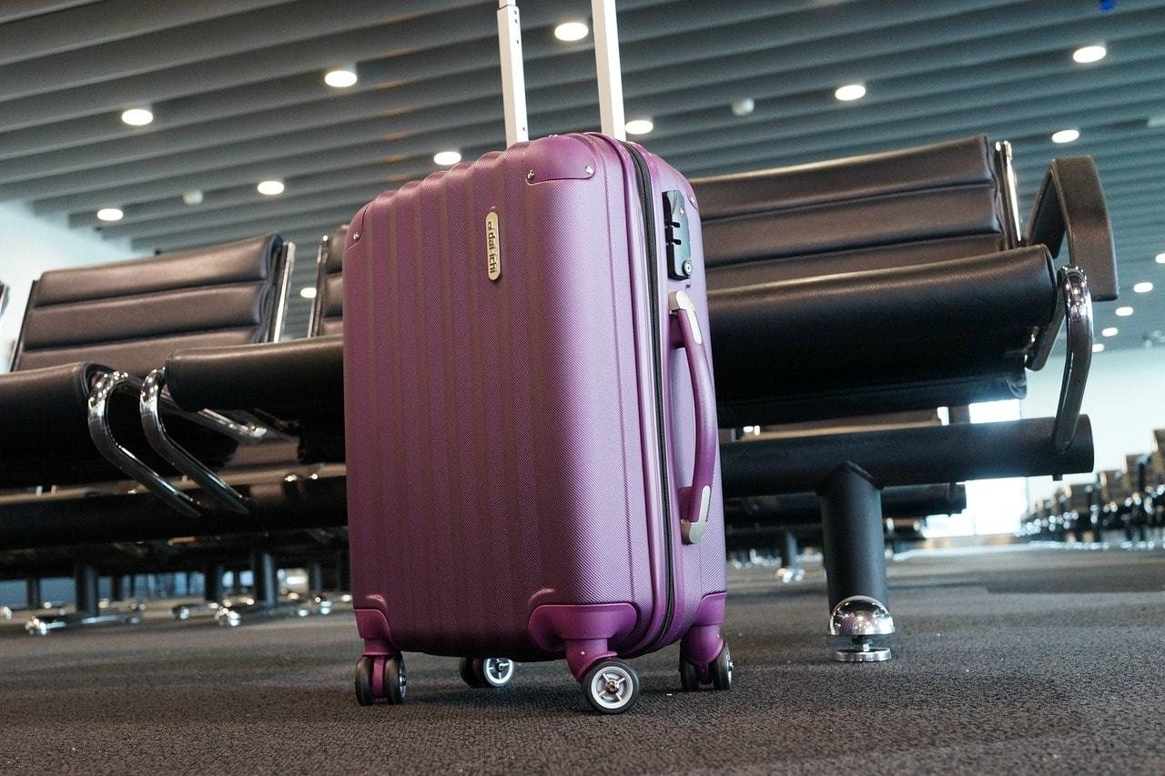 Travel in style with this $117 suitcase and built-in weight scale