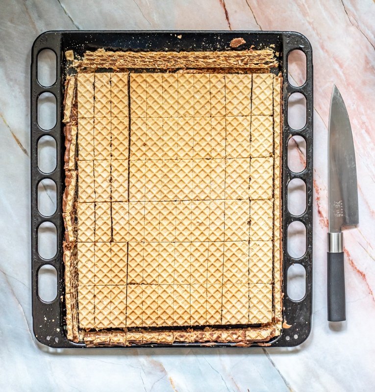 A baking sheet with a pie crust on it.