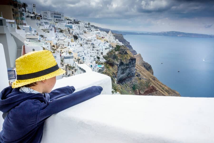 Little boy admiring Santorini With Kids, Greece