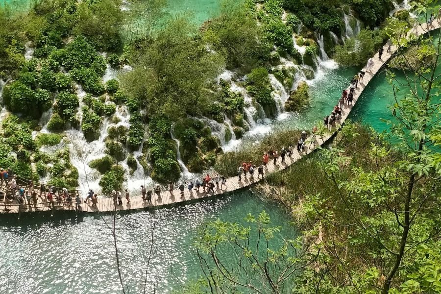 Plitvice Lakes National Park in Croatia is an enchanting destination during the spring season.
