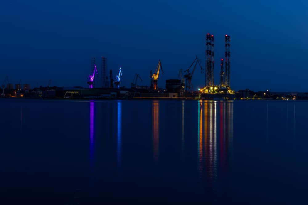 Cranes in the port illuminated by the giant port cranes of Pula in Croatia