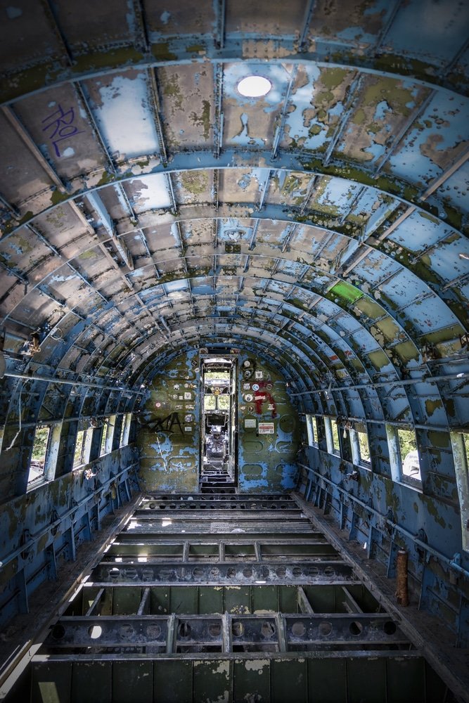 Explore the hidden gems of an old airplane in Zeljava