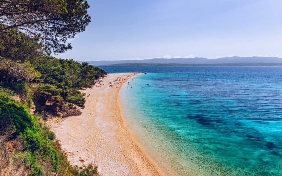 Zlatni Rat (Golden Cape or Golden Horn) famous turquoise beach in Bol town on Brac island, Dalmatia, Croatia. Zlatni Rat beach at Bol on Brac island of Croatia in summertime.
