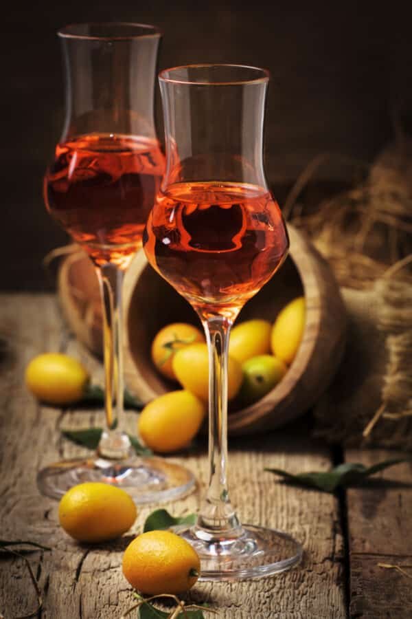 Drinks in Greece - Traditional greek kumquat liqueur in shot glass