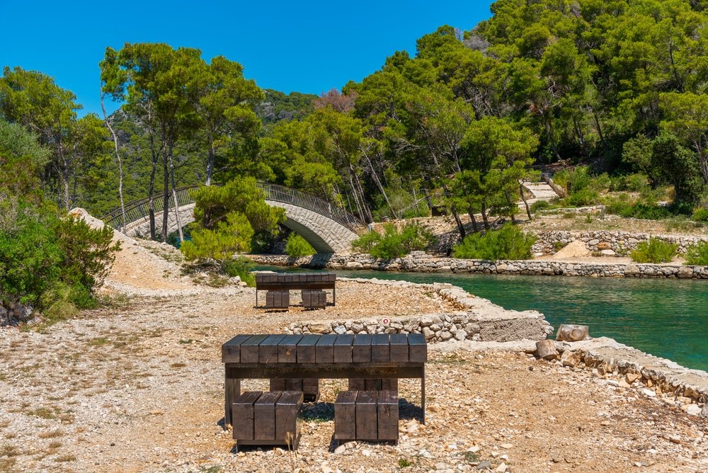 A stunning bridge on Mljet Island, Croatia, offering breathtaking views over the crystal-clear waters. Perfect for those seeking beautiful sights and exciting things to do.