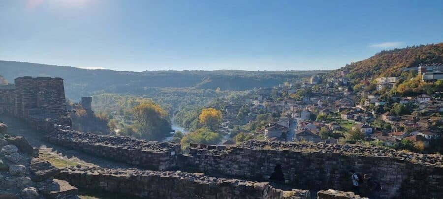 A picturesque castle surrounded by the serene beauty of a river, offering one of the many delightful things to do in Veliko Tarnovo.