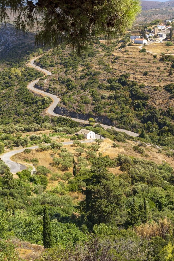 An escapist's paradise, the winding road through the majestic mountains of Crete, Greece takes you on a journey to breathtaking vistas and hidden gems found only in Kythira.