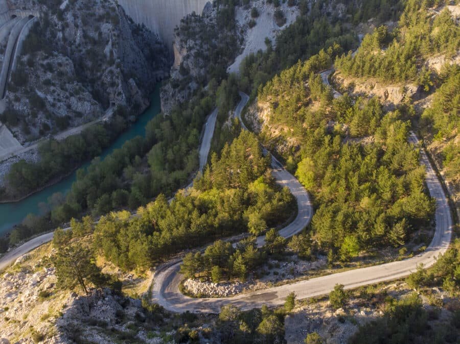 Here Is How To Road Trip In Turkey - Curvy Road and Great Dam on Oymapinar lake, Mountain and Forest in Türkiye - Green Canyon in Oymapinar Mount area at Manavgat, Antalya, Turkey.