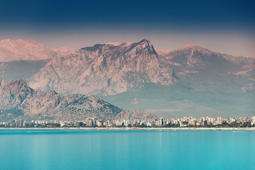 Is Antalya Worth Visiting - Panoramic idyllic view of the Aegean sea in Antalya. Taurus mountains in the background and the blue Bay of the Mediterranean sea
