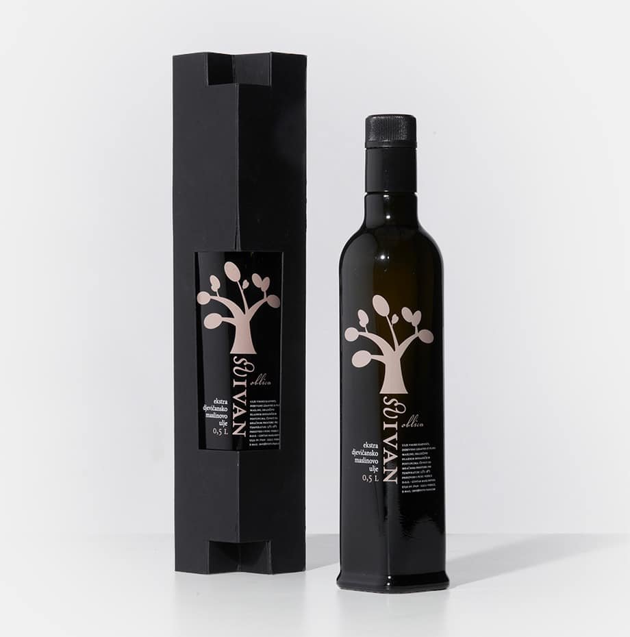 A bottle of Croatian olive oil - Sv. Ivan next to a black box.