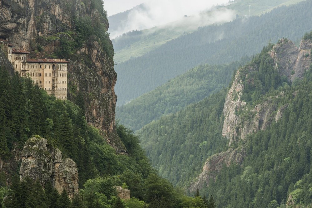 The monastery of Virgin Mary - Altindere Valley National Park - tourist attraction in Trabzon, is sitting on top of a cliff in the mountains.