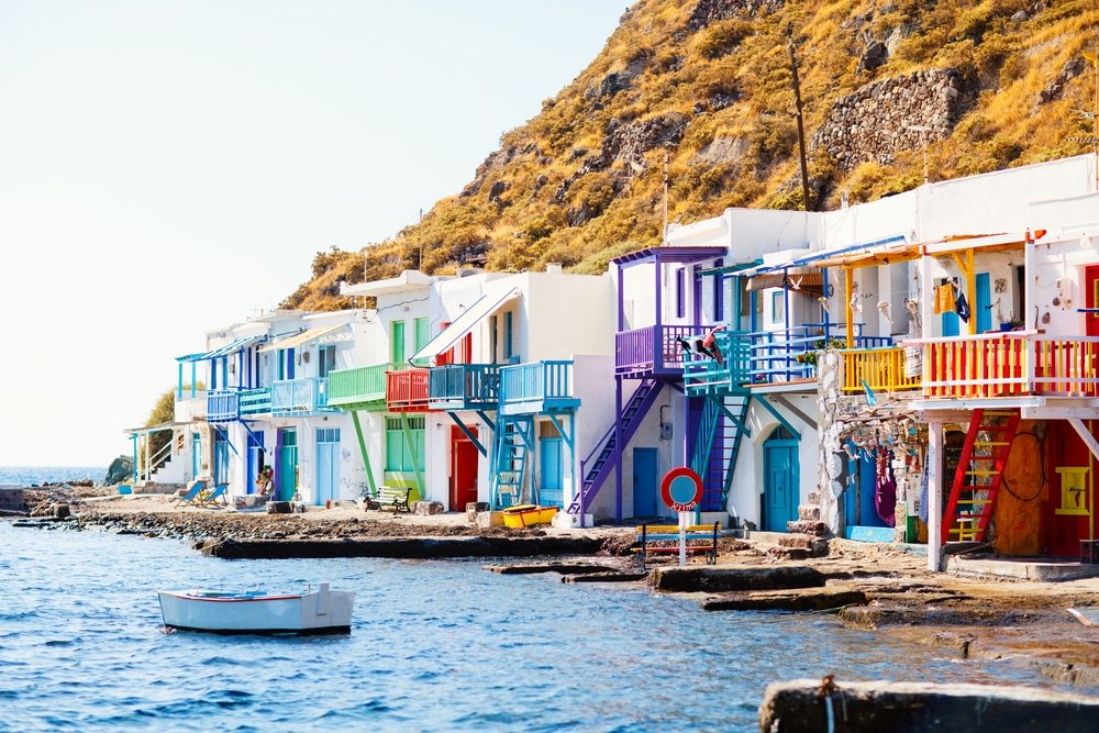 Colorful houses on the side of the water in Milos Island, Greece. Colorful fishing village of Klima .
