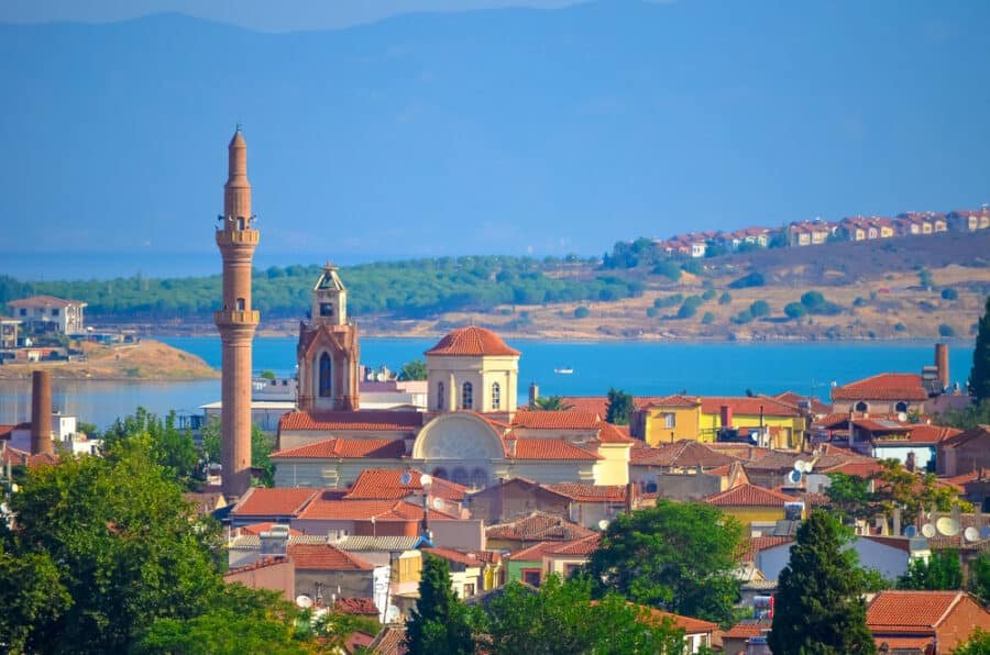 Ayvalik, Turkey - A picturesque city with a church nestled against the breathtaking backdrop of mountains.