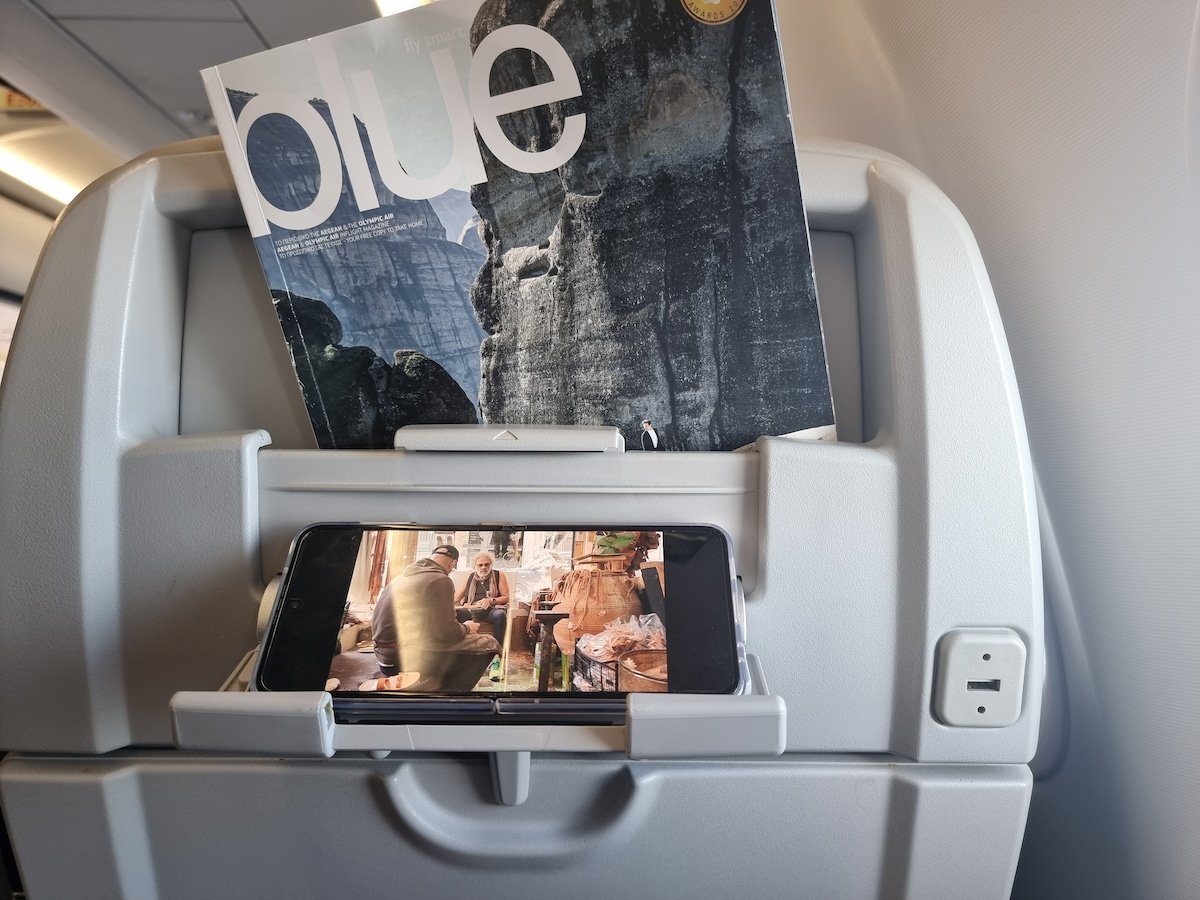 An airplane seat with a magazine on it, found on routes between Mykonos and Athens.