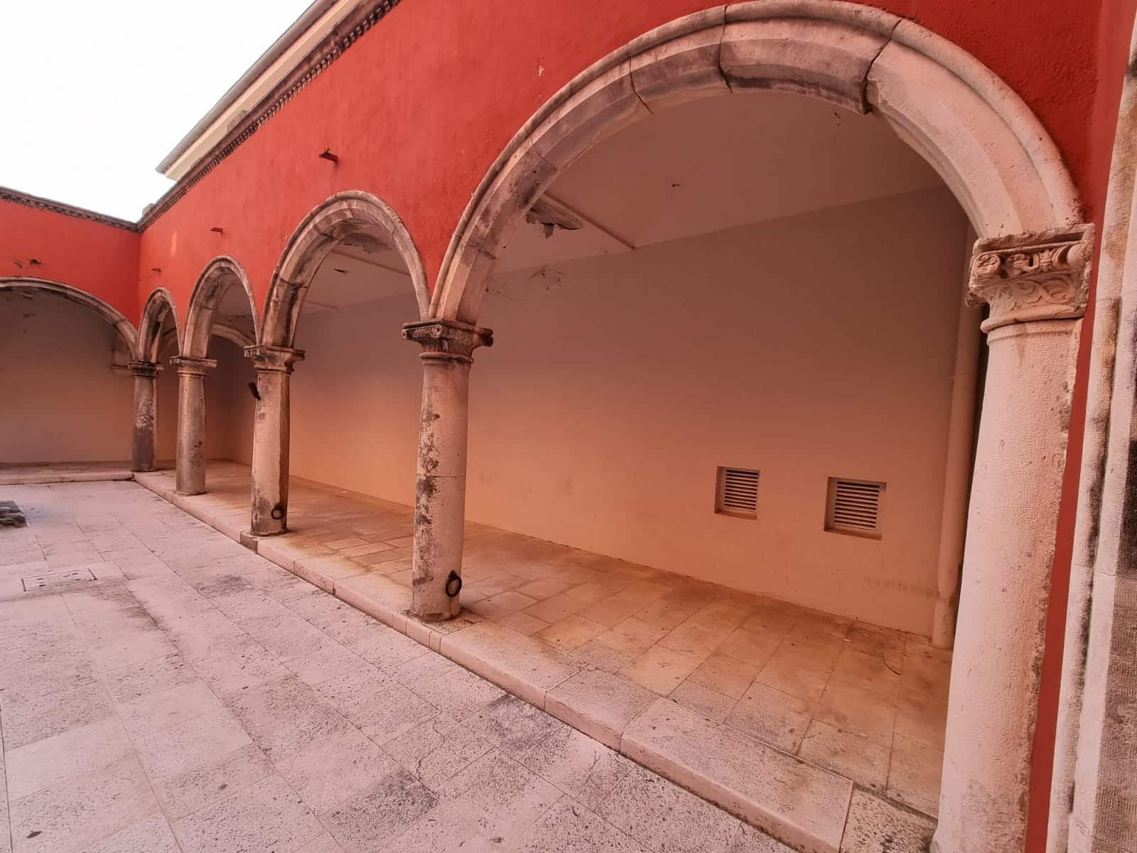 Traveling in Croatia tips - Go to Zadar. The first time I stepped into the courtyard of a building, I was in awe of the magnificent arches and pillars that adorned the space.