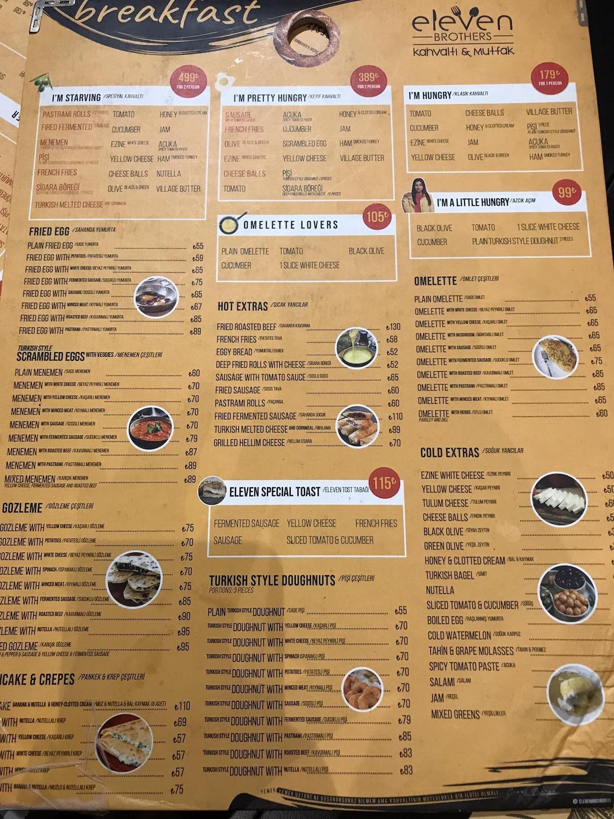 11 Brothers menu with a variety of food on it.