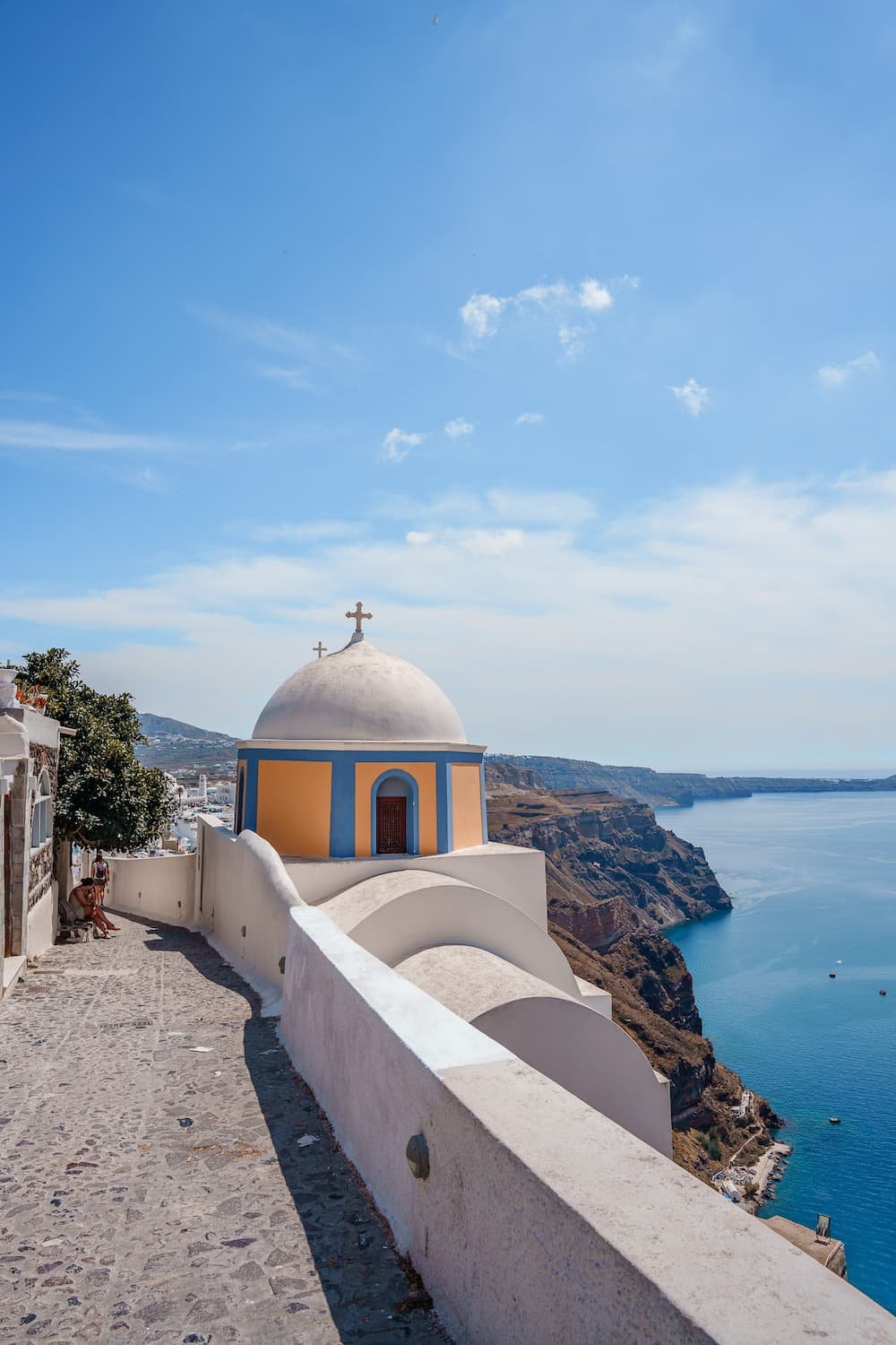 3-Day Santorini Itinerary: Explore the breathtaking beauty of a church on a hill overlooking the sea.
