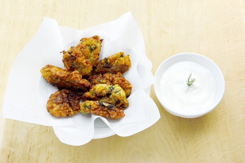 In Athens, you can find a plate of mouthwatering Greek zucchini fritters with tzatziki 