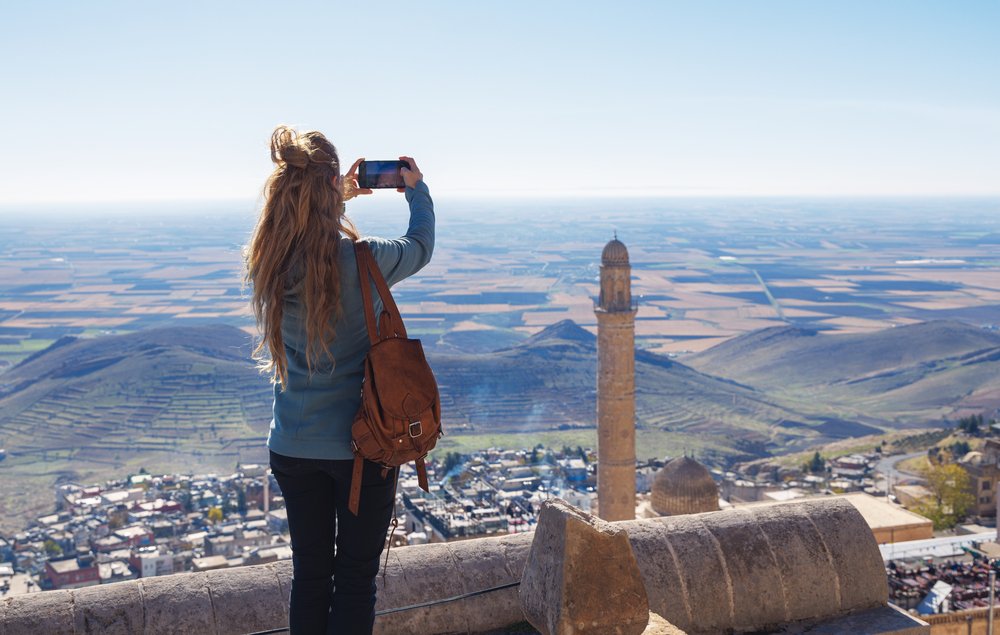 Nicky capturing a breathtaking view of a mardin, a mountain in Southeastern Turkey through her camera lens.