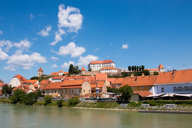 A blue sky with white clouds in the small town of Ptuj in Slovenia. 