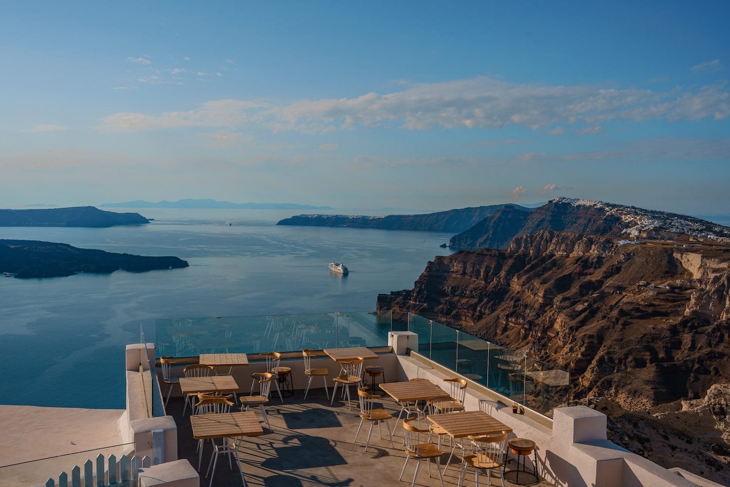 3 Day Santorini Itinerary: Explore the stunning island of Santorini, Greece. Visit iconic blue-domed churches, swim in crystal clear waters and immerse yourself in the rich history and Santos Winery