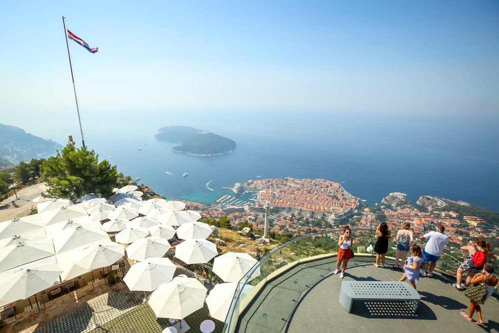 A group of people on a balcony of the Viewpoint on Srd hill Dubrovnik Croatia