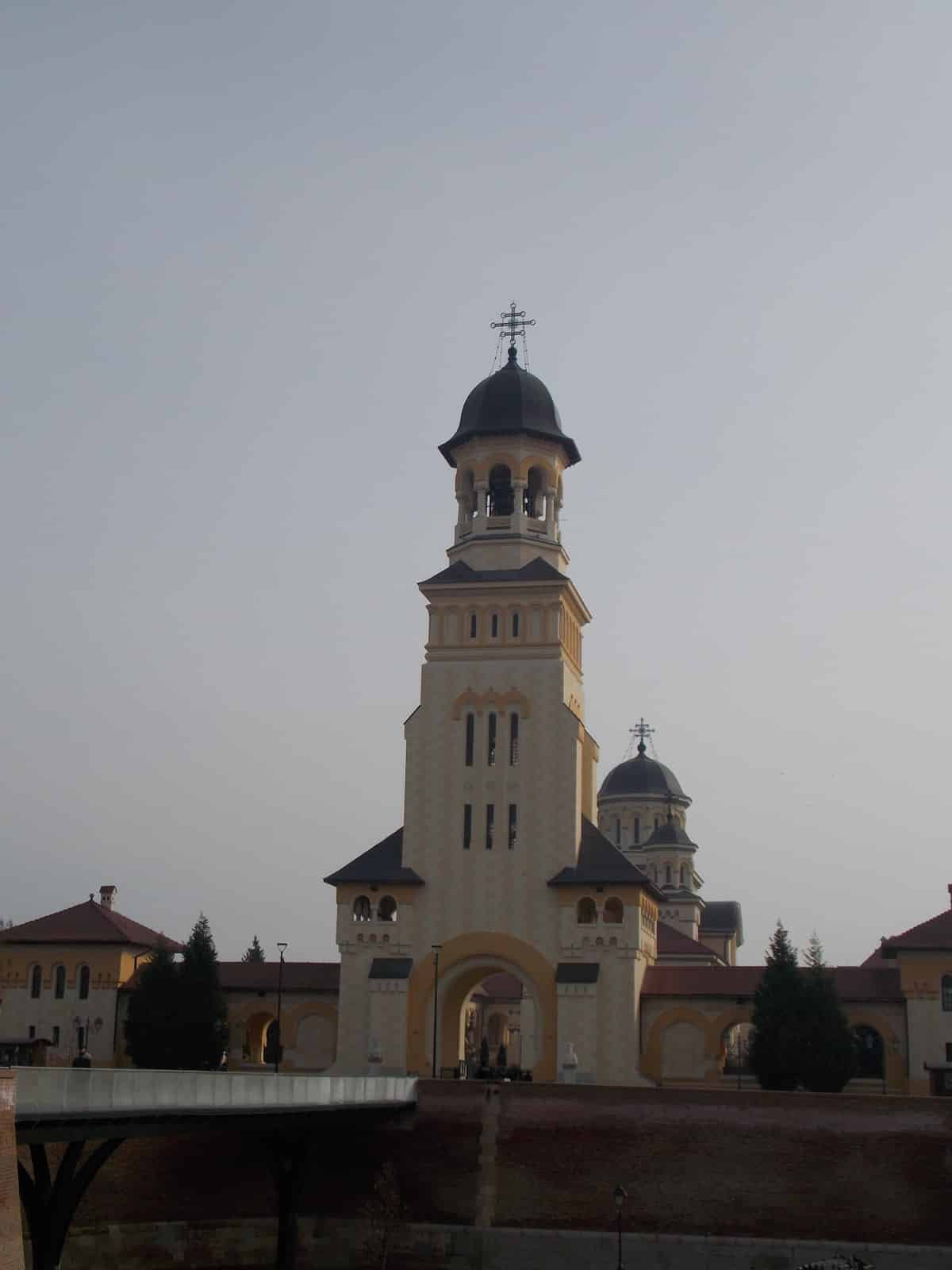 A building with a clock tower. Coronation Cathedral Alba Iulia, Transylvania