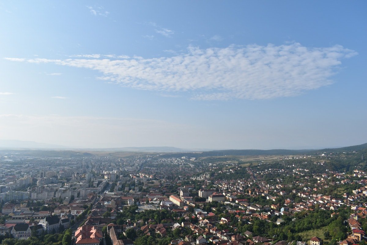 A view of a city from the top of Deva Fortress