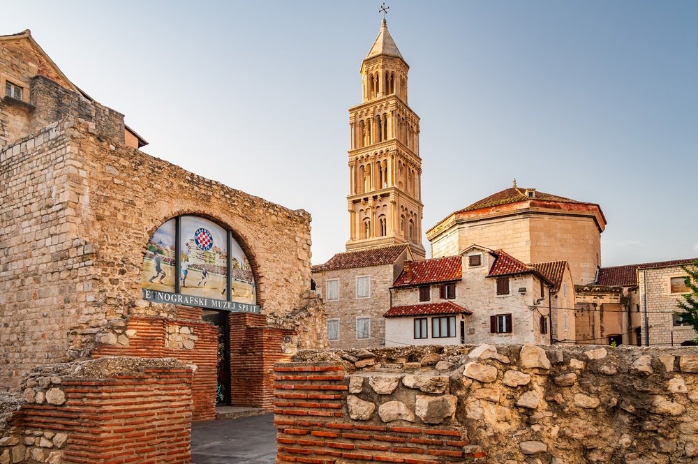 Historical architecture with a bell tower in a Croatian old town setting.